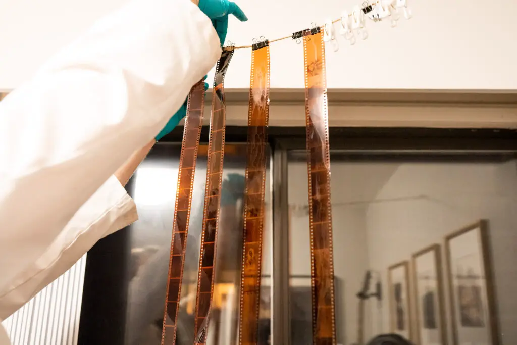 Hanging film on a wire to dry.