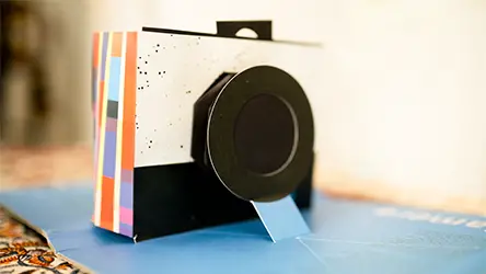 A popup book that forms a working camera