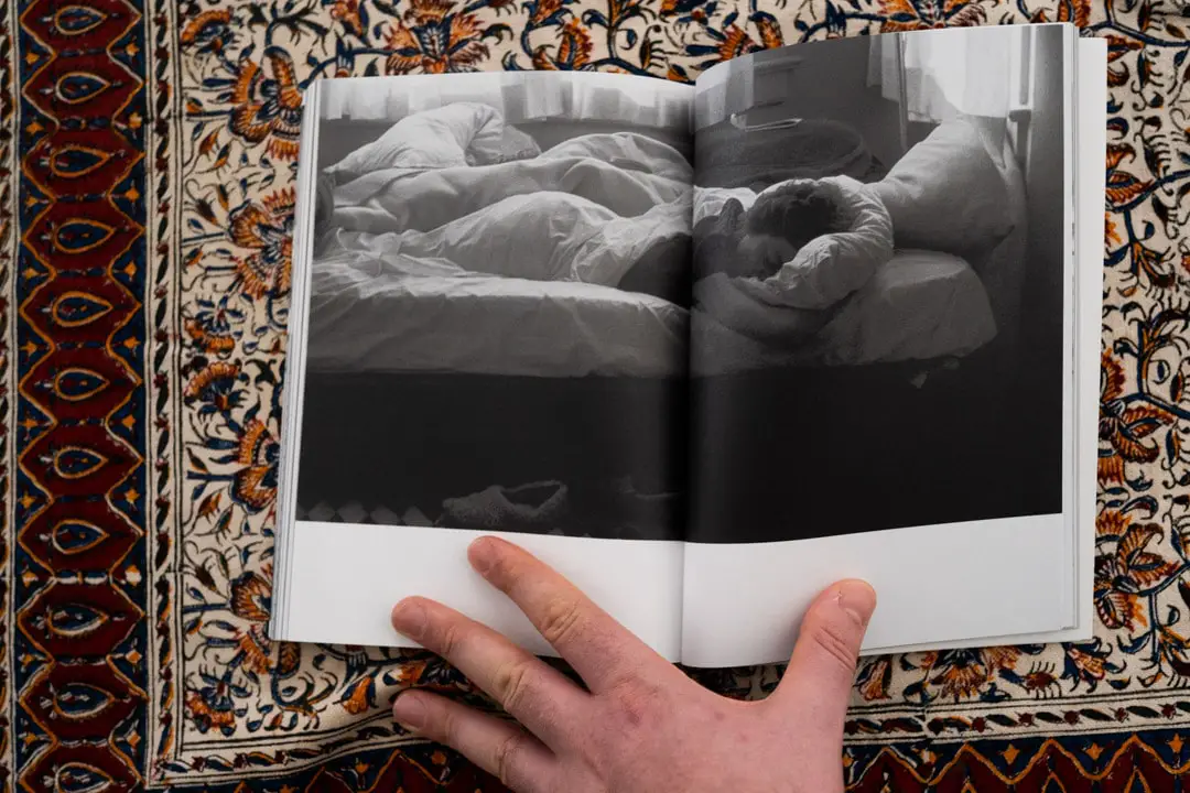 A Day Sleeper photographed and published in the book Day Sleeper, by Dorothea Lange and Sam Contis