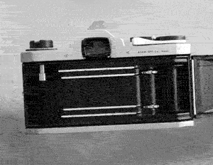 A gif showing how to load a Pentax film camera