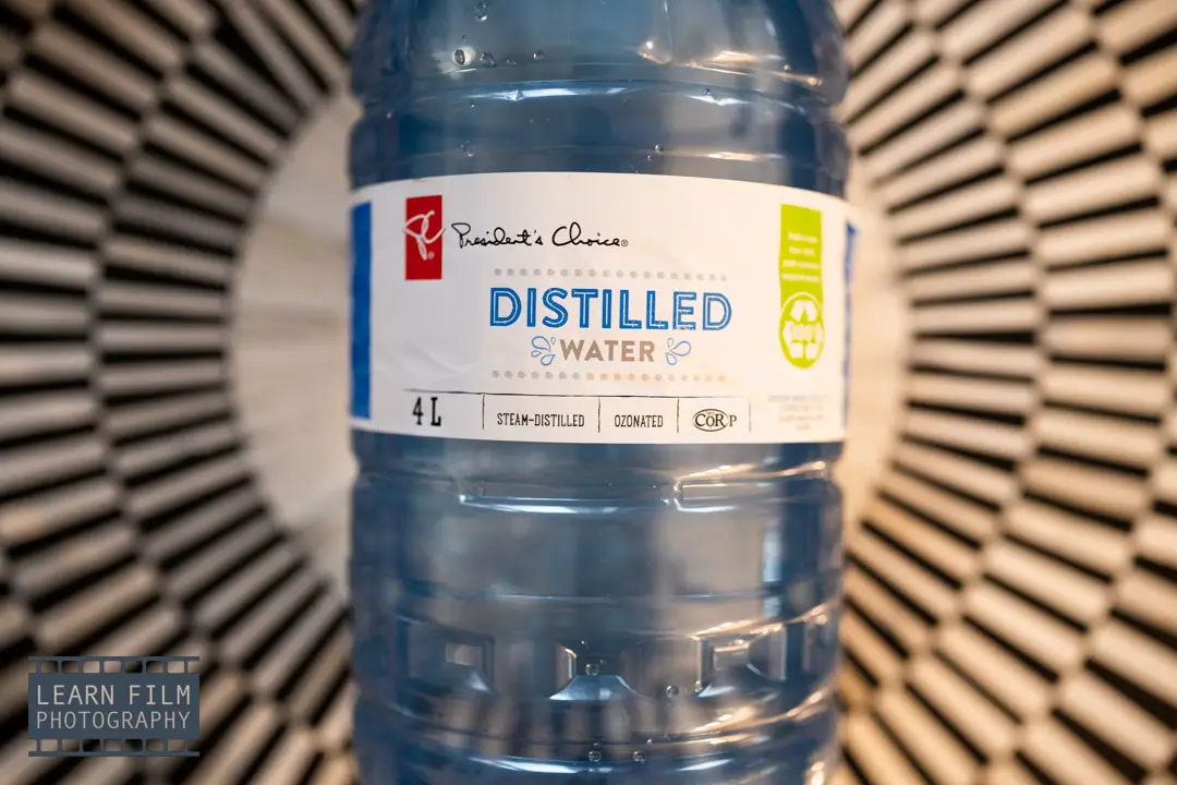 Distilled water for developing film