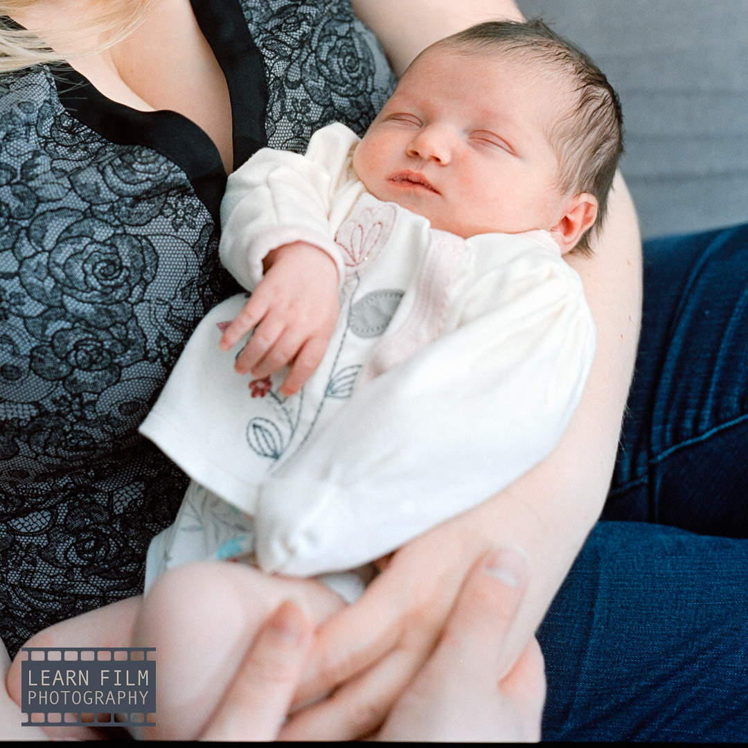 A photo of a baby indoors captured using off camera flash.